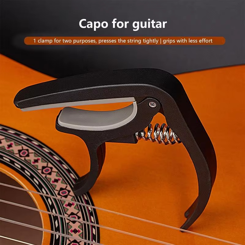 Capo de guitarra portátil de p - Musical Instrument Gif reseña y precio