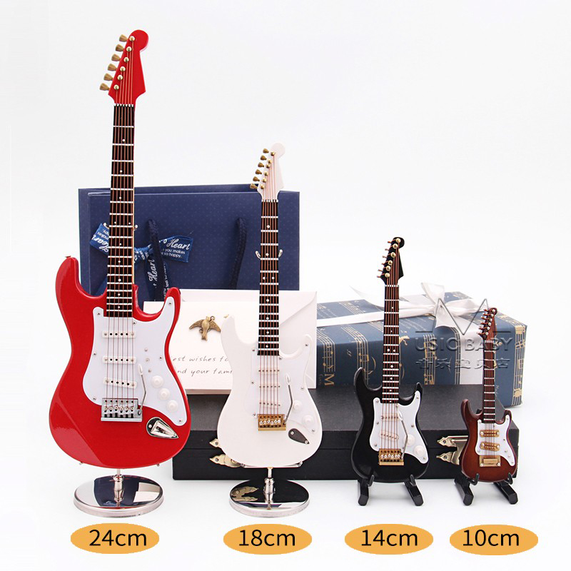 Mini guitarra eléctrica de mad - Musical Instrument Gif reseña y precio